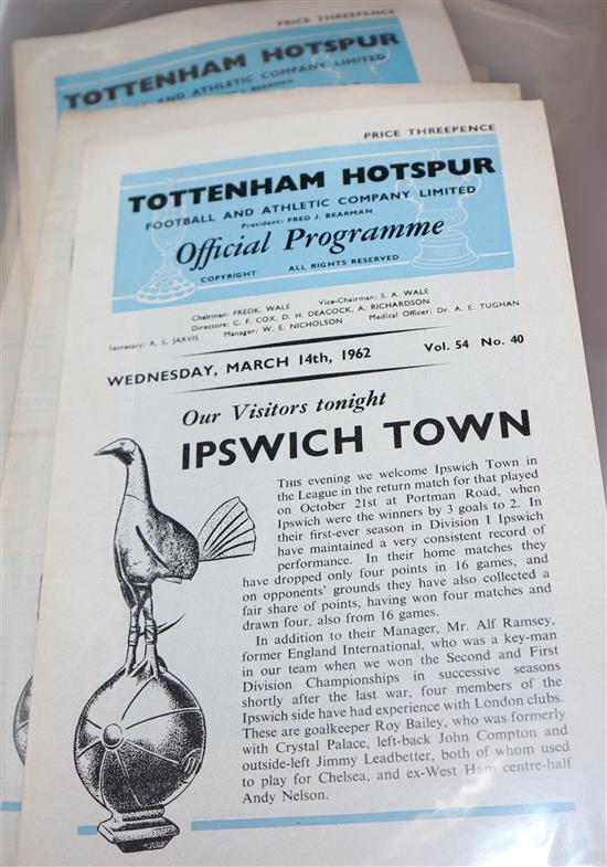 A large collection of Tottenham Hotspur memorabilia including programmes, official season handbooks, ticket stubs and a rattle,